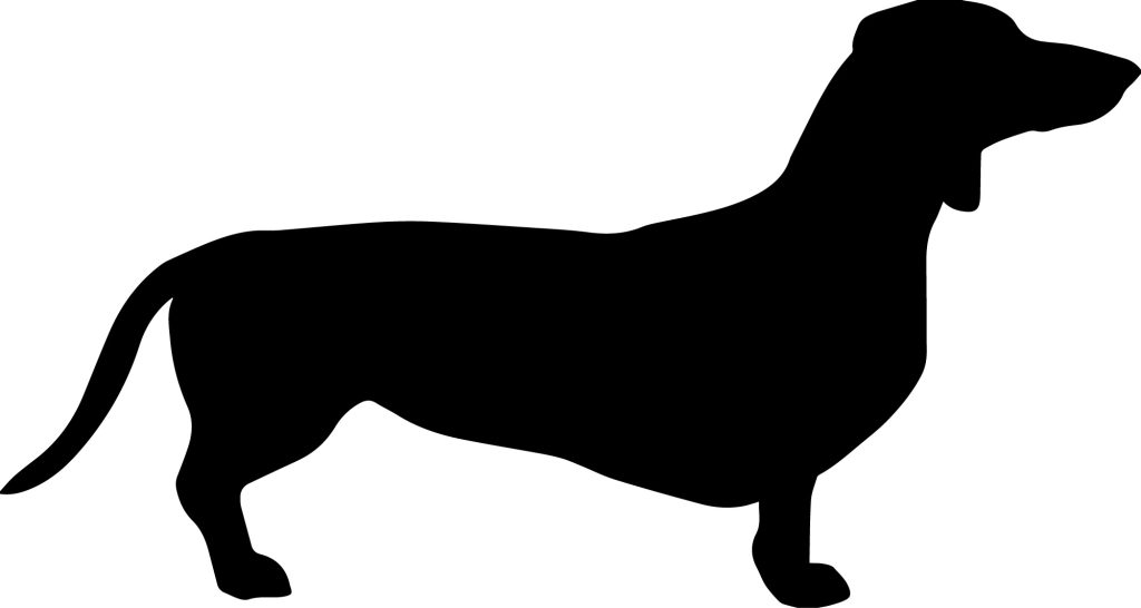 A silhouette of a dog in profile.