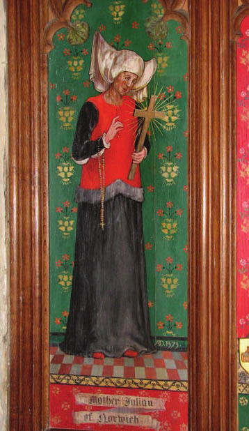 Portrait of a women holding a cross with a rosary hanging from her arm.
